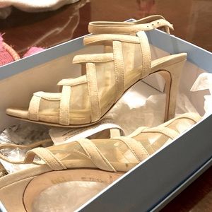 Sandals with high heel.